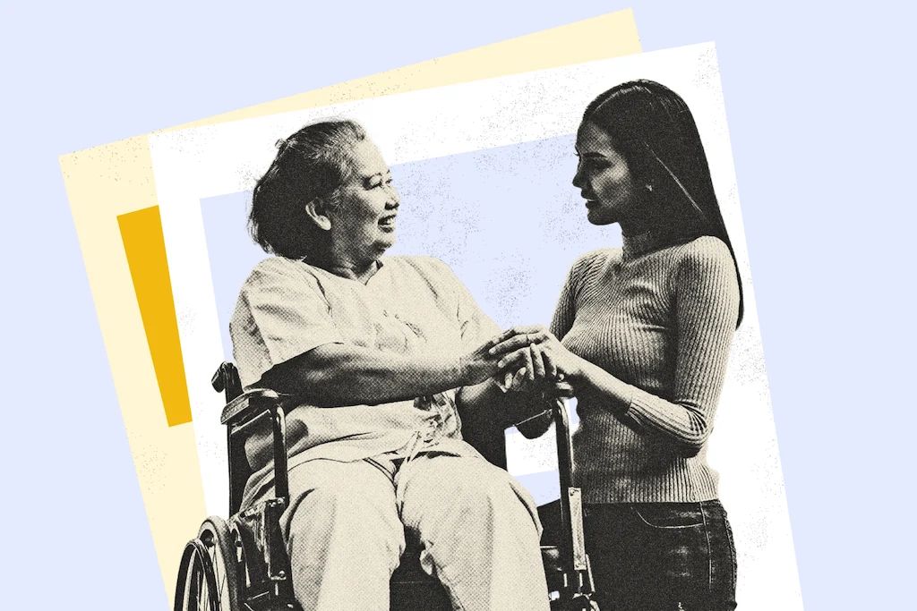 An older woman in a wheelchair smiling and holding hands with a younger woman, symbolizing family support and decision-making under a power of attorney.